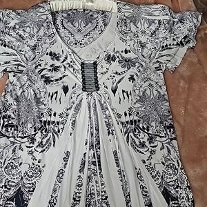 Silk 0X Flowing black and white patterned shirt. Made by World Unity. New